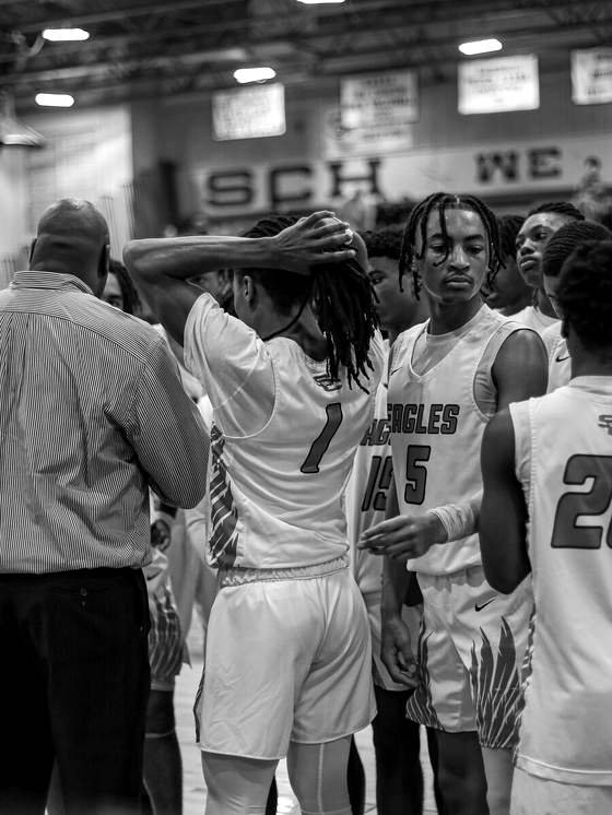 Team huddle, hands in