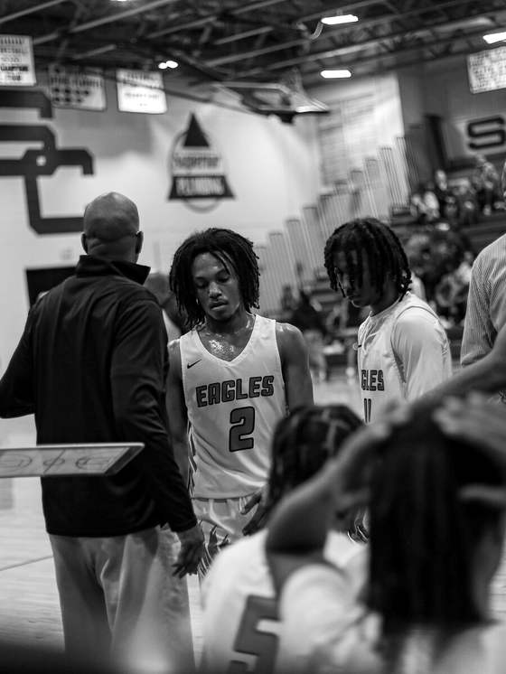 Coach and player during a timeout